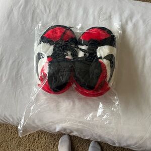 NWT Air Jordans Cozy plush slippers in red and black. Perfect for